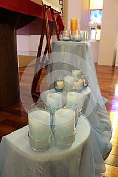 Candles arranged in front of altar for taize meditation in a Salesian Catholic chapel