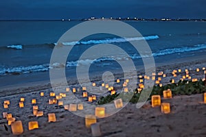 Candles on Beach at Dusk