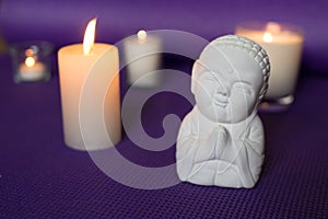 Candles and buddha in relaxation space