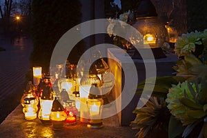 Candles burn on the All Saints` Day in christian countries