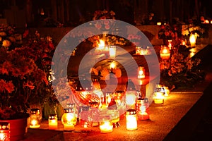 Candles burning at a cemetery