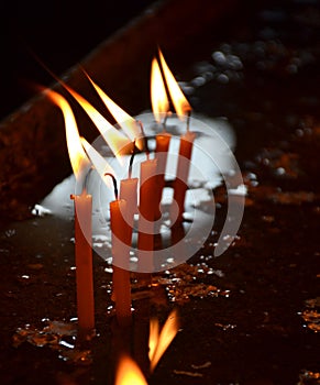 Candles burning in a church