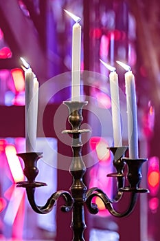 Candles in candle stick holder with blurred background