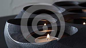 The candles are carefully arranged within the sculptural design creating a harmonious balance between functionality and