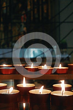 Candles in a church, light and fire photo