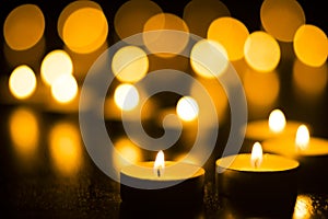 Candles on Dark Background for Thanksgiving, Valentines Day, Happy Birthday, Memorials, Festive, Christmas and Romance photo
