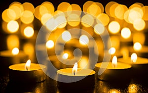 Candles on Dark Background for Thanksgiving, Valentines Day, Happy Birthday, Memorials, Festive, Christmas and Romance photo