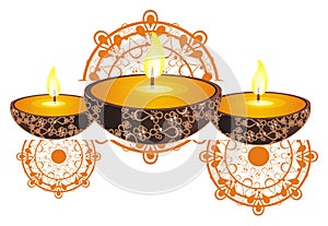 Candles with fire and ornament of India