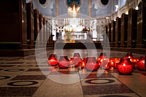 Candles on the floor in the church.