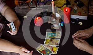 Seance of fortune telling on a Tarot cards