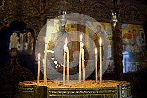 Candles in front of the iconostasis of the Greek Orthodox Church in Nazareth