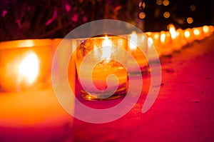 Candles in glass jars put as romantic lamps