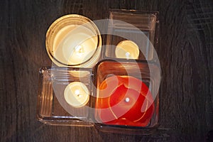 Candles glowing in glass