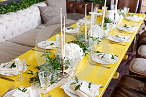 Candles and goblets on a decorated wedding table