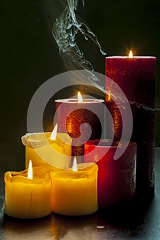 Candles and gray smoke