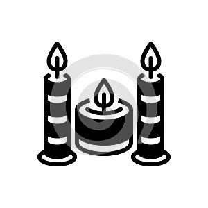 Black solid icon for Candles, candlestick and light