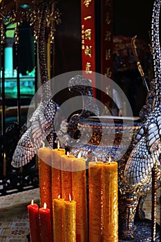 Candles lit on alter, Pagoda Chua Min Huong, Ho Chi Minh City