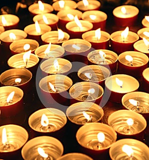Candles lit with the flame during the religious ceremony