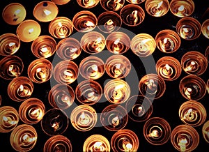 Candles lit with the warm flame during the religious ceremony