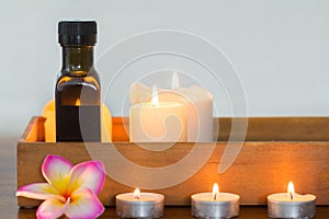 Candles and massage oil composition