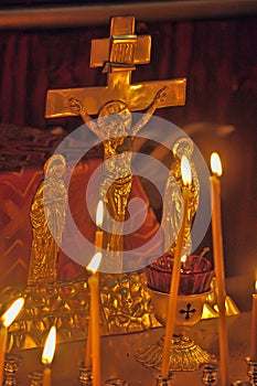 Candles near the crucifix in the church