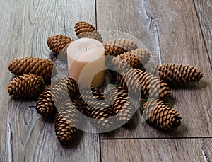 Candles on old wooden background