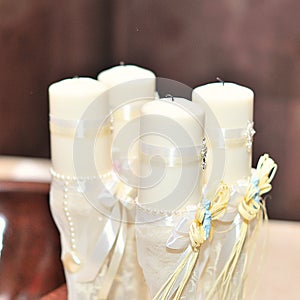 Candles during orthodox christening baptism.