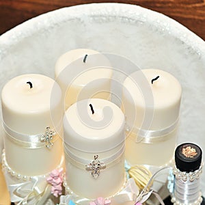 Candles during orthodox christening baptism.