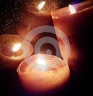 Candles reflection nightime photo