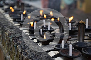 Candles in the Shwedagon pagoda, Yangon, Myanmar