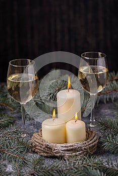 Candles and two glasses wine