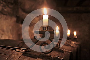 Candles in wine-cellar