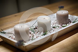 Candles on wooden table normal- rest and relaxation