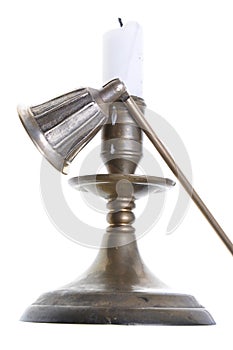 Candlestick with a candle and snuffer