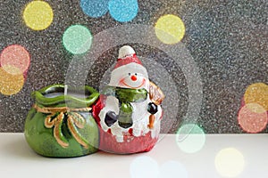 Candlestick in the form of a cute Christmas snowman