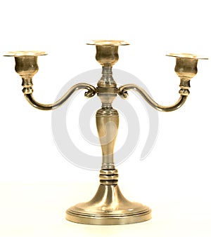 Candlestick with three candles isolated