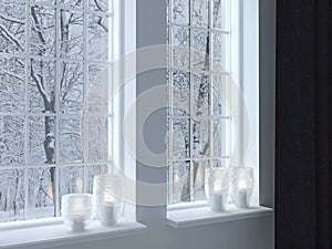 Candlesticks on a windowsill. photo