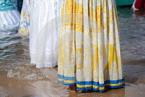 Candomble fans are seen paying tribute during a party for iemanja on Rio Vermelho beach, in the city of Salvador, Bahia