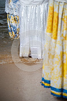 Candomble fans are seen paying tribute during a party for iemanja on Rio Vermelho beach, in the city of Salvador, Bahia