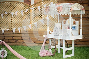 a candry buffet awaits hungry guests for an outdoor wedding reception