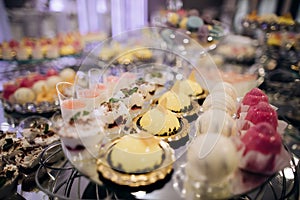 Candy bar, cake on wedding reception, catering food