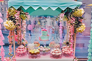 Candy Bar. Delicious sweet buffet with cupcakes and wedding cake. Sweet holiday buffet with marshmallows and other