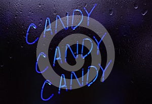 Candy Candy Candy Neon Sign in Rainy Window Candy Shop