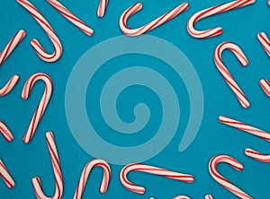 Candy Cane Background on a Blue Background