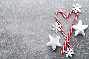 Candy cane. Christmas decors with gray background.