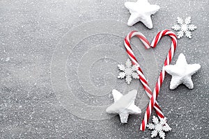 Candy cane. Christmas decors with gray background.