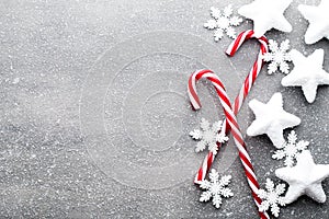 Candy cane. Christmas decors with gray background.