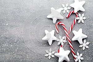 Candy cane. Christmas decors with gray background. photo