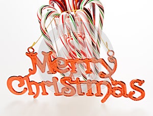 Candy canes with Merry Christmas sign