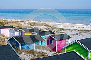 Candy coloured beach hut on Skanor beach in Falsterbo, Skane, Sweden. Swedish tourism concept